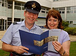 Wing Commander Hugh Milroy with Deborah Mohan, Course Leader at the School of Social Work at the University of Gloucestershire