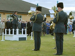 The Commander in Chief, Air Marshal Sir Christopher Coville takes the salute in front of the Central Band