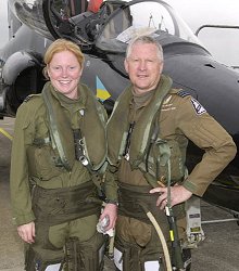Flight Lieutenant Kirsty Stewart and father Squadron Leader Robbie Stewart alongside the 208 Squadron Hawk in which they flew their mixed-profile navigation sortie