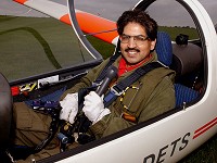 Manny settles in the Vigilant’s cockpit for his glider flight