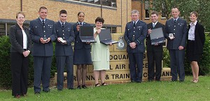 The Learning Forces Awards group at PTC Headquarters, from the left: Sue Cline, North Lincs College; Sgt Stephen Hannay; Cpl Stephen Russell; SAC Shona Maher; Mrs Martine Sowry; AVM Graham Jones; Chf Tech Christopher Buxton; Cpl Royston Beddis and Caroline Thorpe, UFI Learndirect.