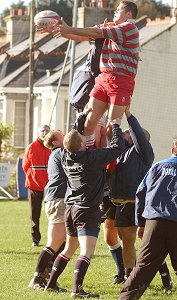 Rising to the challenge. The Combined Services team prepare for the big match against the world-famous Barbarians. Jim Thorp is central to the successful line-out take.