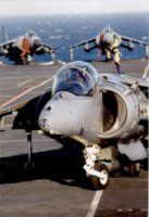 Harrier GR7s on board an aircraft carrier with Harrier FA2s